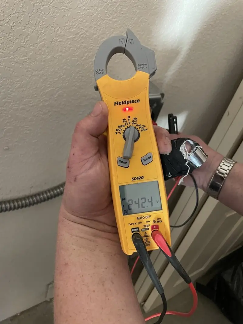 Voltage testing with clamp meter during Ceiling Fan Installation in Aberdeen